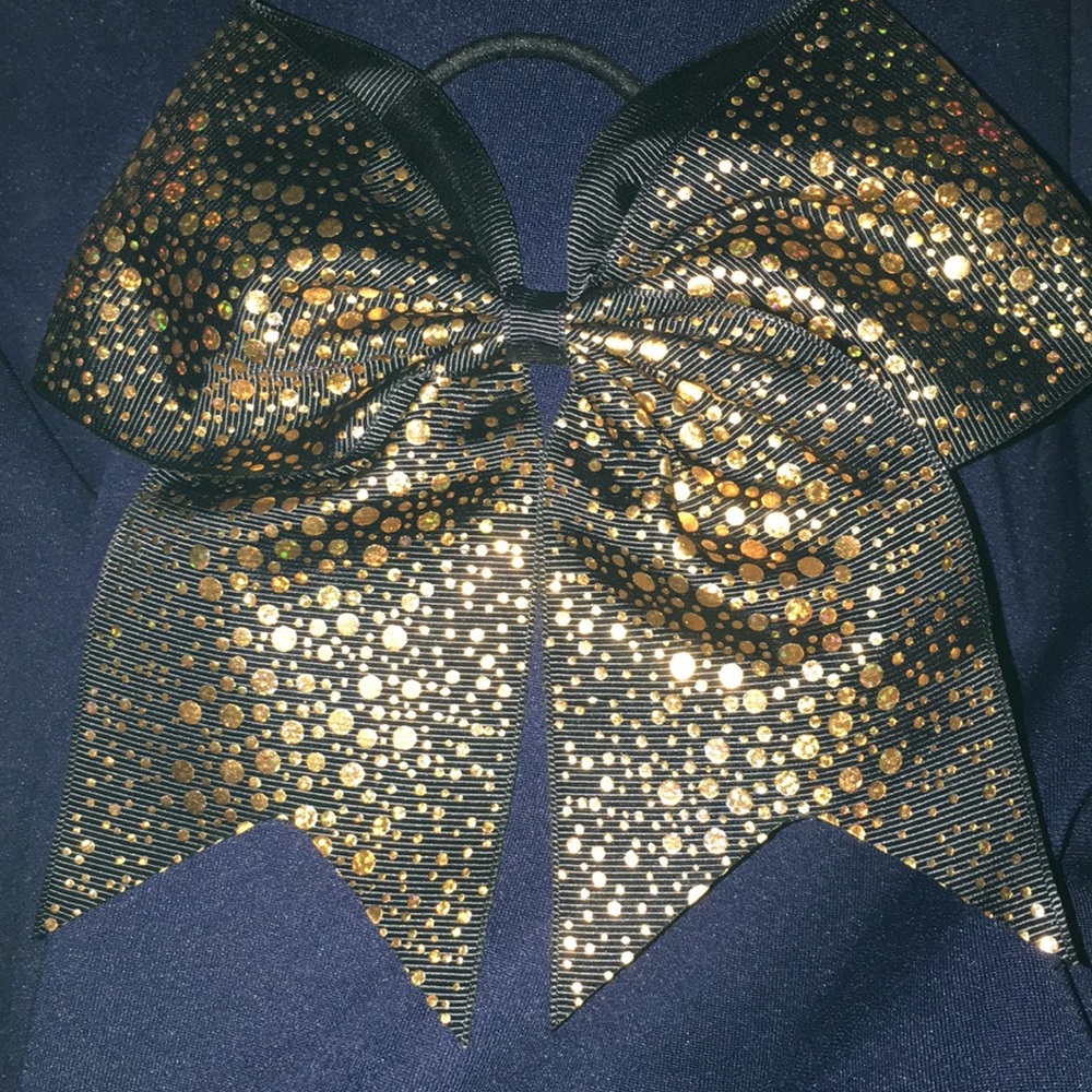 Black and gold UCF cheer bow